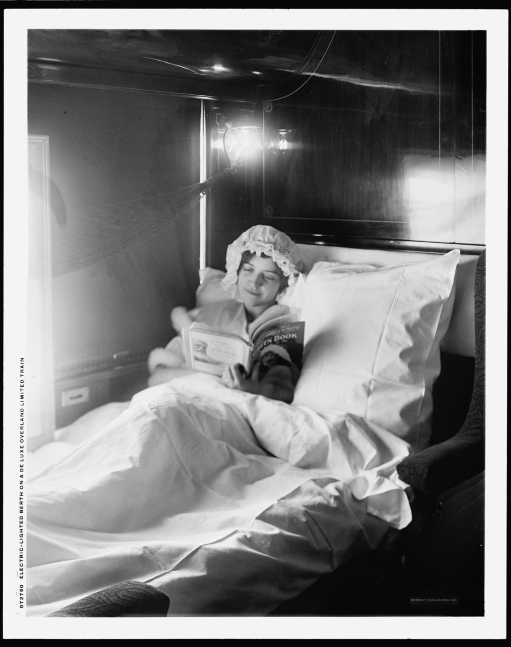 Electric-lighted berth on a deluxe cross-country train, ca. 1910s
