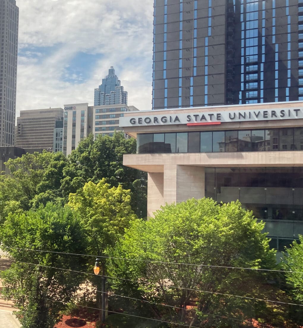 Color photograph of a modernist building with signage reading GEORGIA STATE UNIVERSITY.