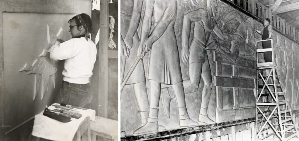 On the left, a woman in jeans and a bandanna is carving a bird on a wall, in relief; on the right, a man on a ladder is carving or painting an immense mural, depicting a hurdler in running clothes jumping over a hurdle.