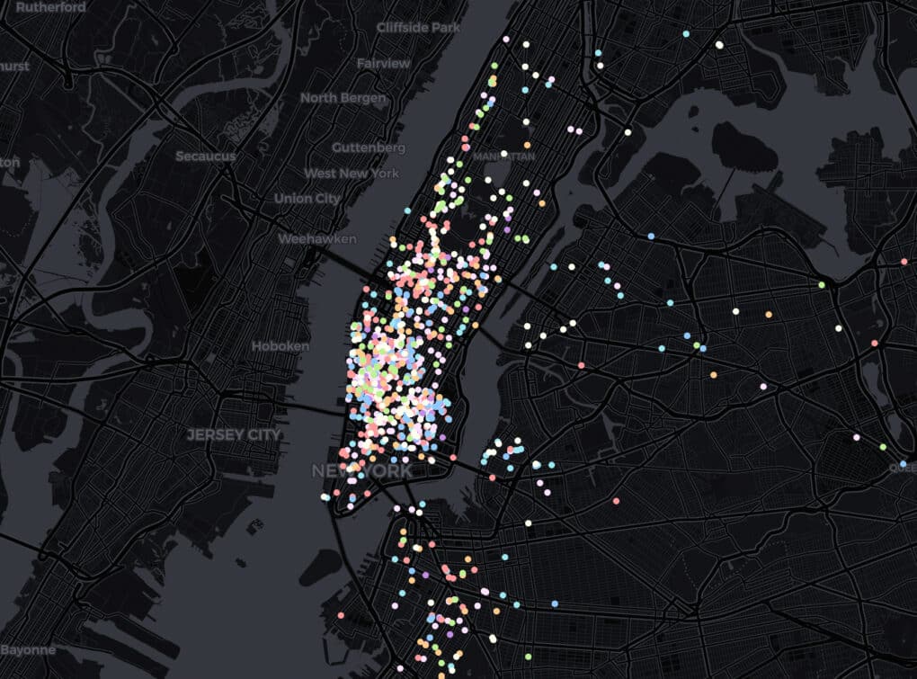 Grayed-out map of New York and New Jersey, studded with pastel-colored dots, especially in Manhattan.