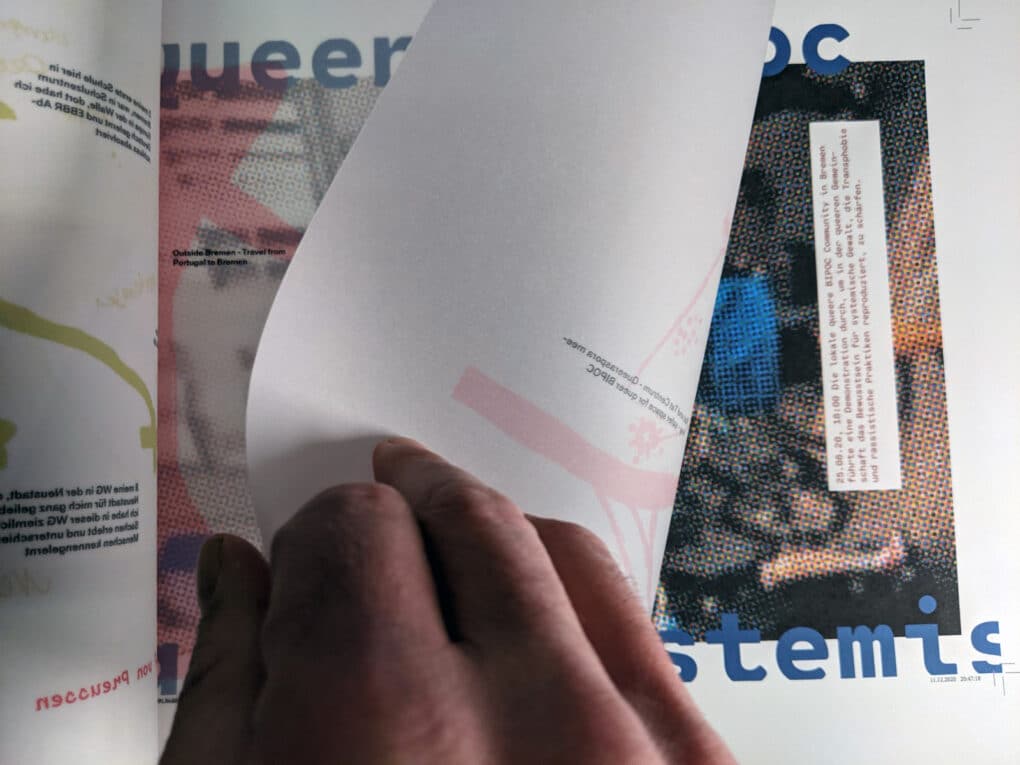 Pages of an open booklet, with hand-drawn maps. A reader's hand has already turned halfway to the next page, on which a roughly rasterized image can be seen.