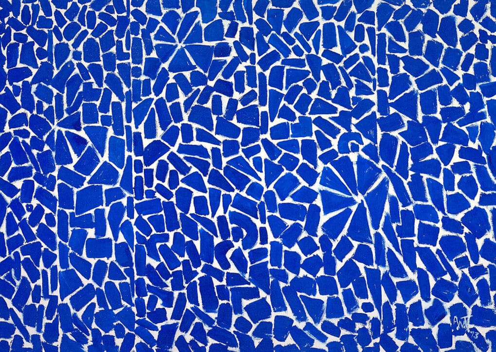 Color photograph of large painting of blue lozenges and triangles on white ground.