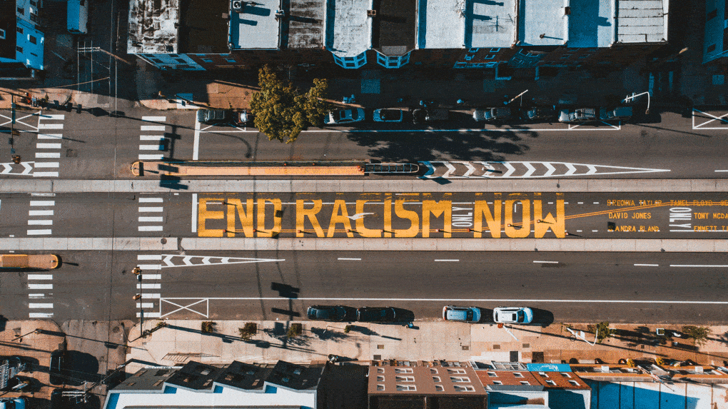 Road in Philadelphia, with the slogan "End Racism Now"