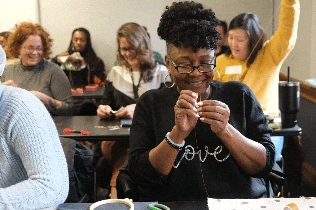 New York City public school teachers learning to patch during a Climate Action Day workshop hosted by Repair Shop. 
