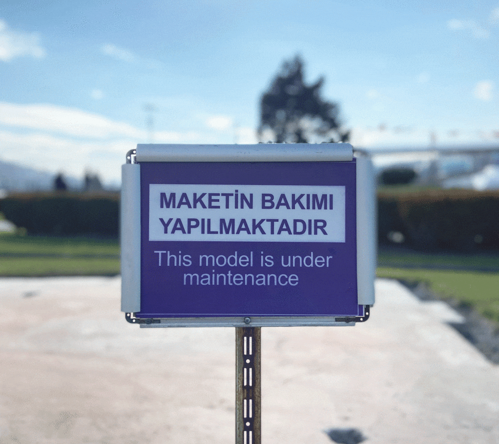 The Republic is under maintenance: a sign in front of the Taksim Square Monument's 1/25 scale model at Miniatürk, the theme park,on the shores of the Golden Horn, Istanbul.