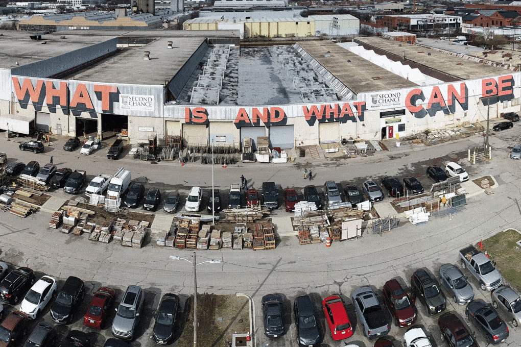 “Love Letter to Baltimore,” a mural by artist Scott Powers, adorns a warehouse for reclaimed material in South Baltimore.
