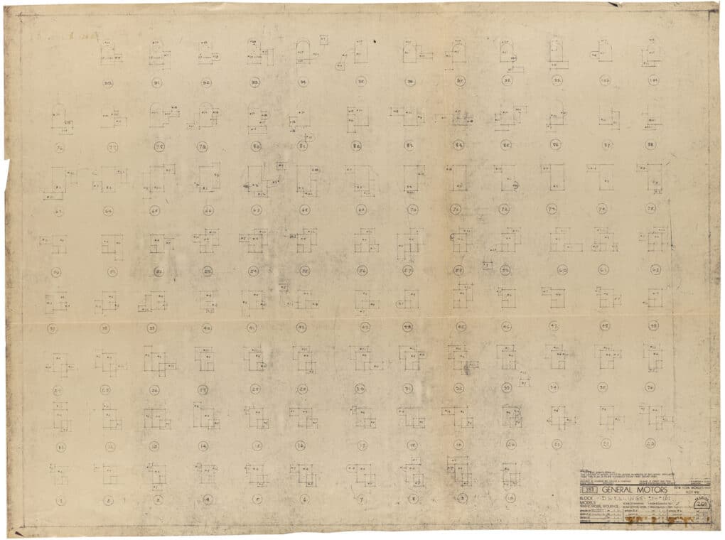 Sepia-toned blueprint showing eight rows of dwellings seen from above, each with a different arrangement of house and garage plan.