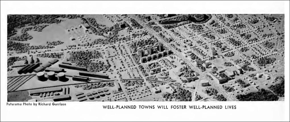 Black-and-white illustration of model town seen from the sky.