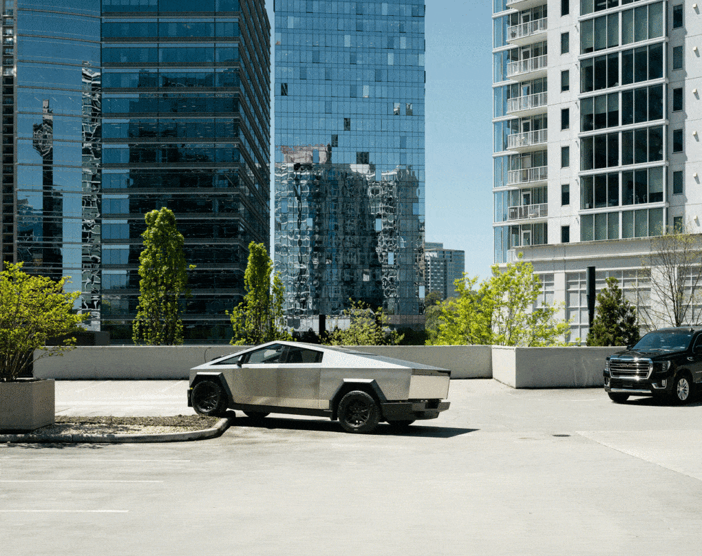 Buckhead, Atlanta, Georgia, 2014. Photograph by Joshua Dudley Greer, depicint a Texla Cybertruck badly parked on a rooftop lot. 