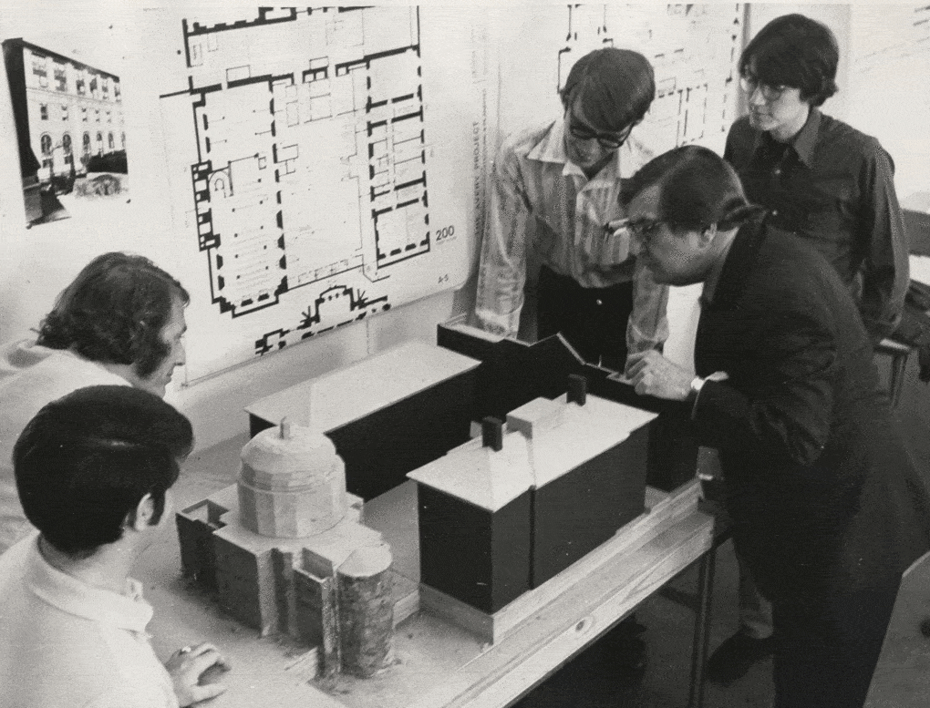 James Marston Fitch (right) and instructor Theo Prudon (second from left) examining a historic preservation thesis project at Columbia, 1974. 