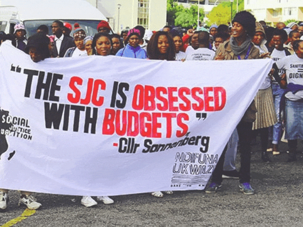 Photo of a rally in Cape Town, South Africa, on behalf of budget justice, co-organized by the Social Justice Coalition and Ndifuna Ukwazi.