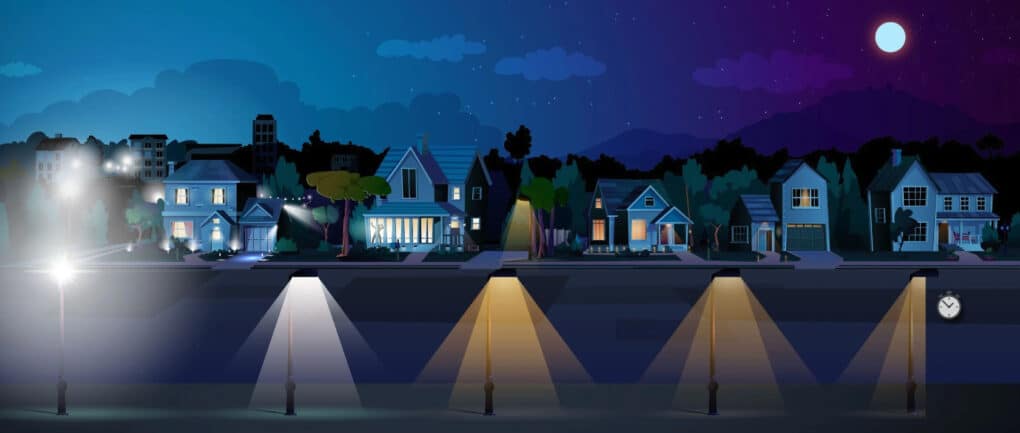 Color illustration of five houses on a suburban block at night, each house putting forth a progressively reduced amount of light.